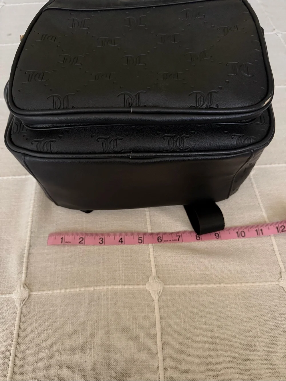 Juicy Couture Black Embossed Logo Backpack with Gold Hardware